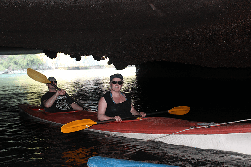 Do kayaking through Dark cave to explore lagoons inside